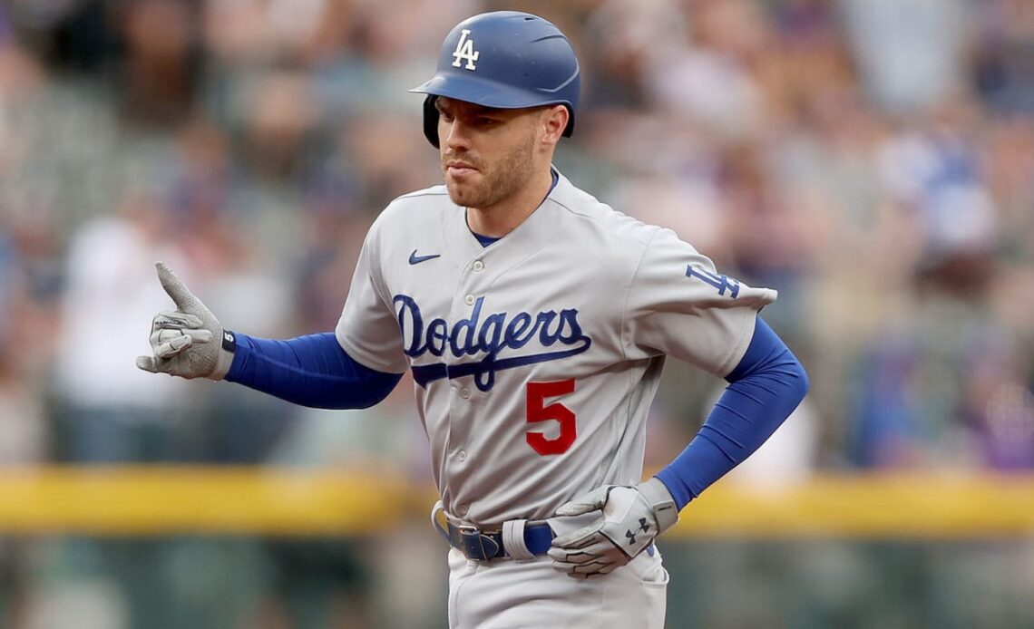 Dodgers hit three homers to take finale from Rockies